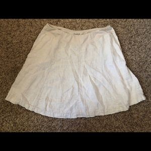 Cream colored linen mini skirt with pockets